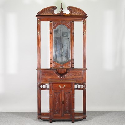 Lot 155 - A Victorian style carved hardwood hall stand...
