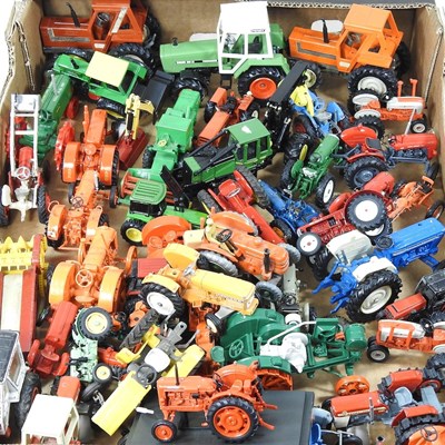 Lot 402 - A large collection of model toy tractors, to...