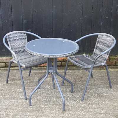 Lot 303 - A woven garden set, with two chairs (3)