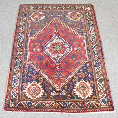Lot 419 - A Persian rug, with a central medallion, 158 x...