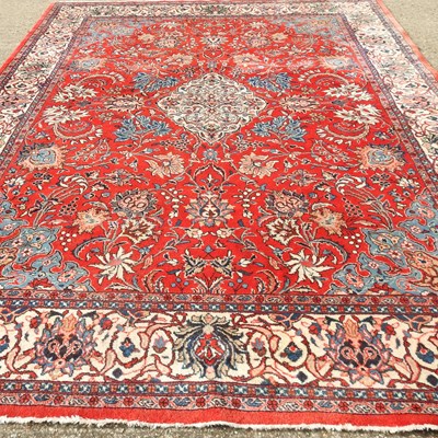 Lot 411 - A Persian woollen carpet