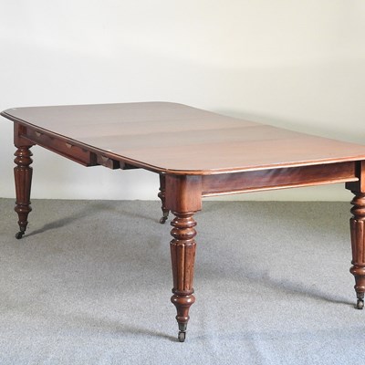 Lot 750 - A Victorian style pull out extending dining...