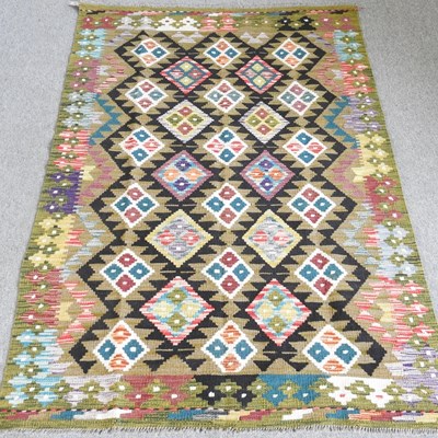 Lot 295 - A kelim rug, with all over diamond pattern, on...