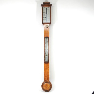 Lot 19 - A 19th century light oak cased stick barometer,...
