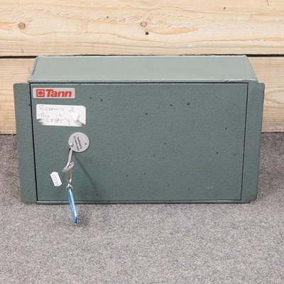Lot 408 - A metal jewellery safe, with key