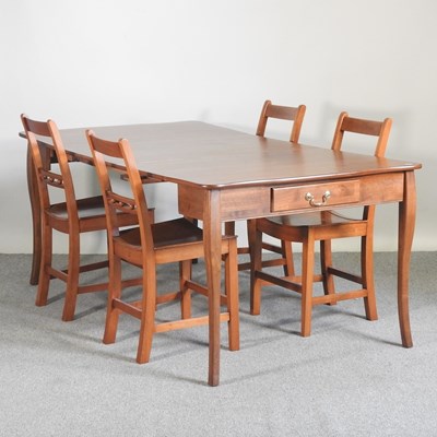 Lot 394 - A modern Stakmore pull out extending dining...