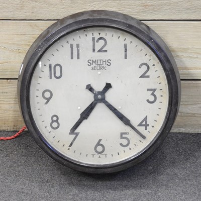 Lot 56 - A 1930's Smith's bakelite cased electric wall...