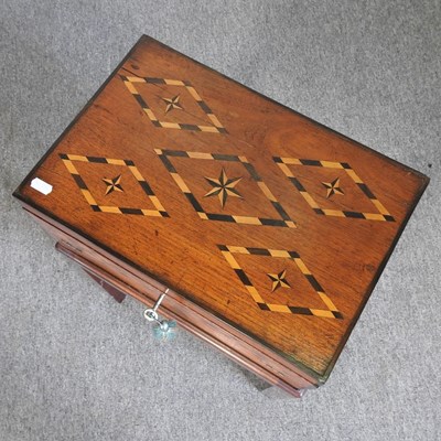 Lot 538 - A 19th century parquetry writing slope, with a...