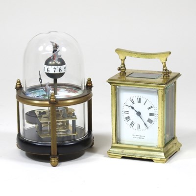 Lot 297 - A miniature brass cased carriage clock, the...
