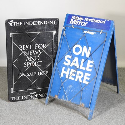 Lot 385 - A folding metal newspaper advertising A board,...