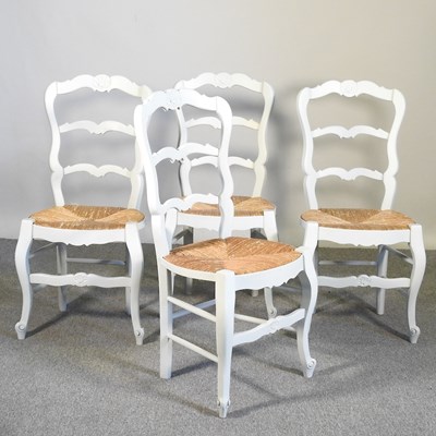 Lot 264 - A set of four French style white painted...
