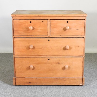 Lot 423 - An antique pine chest of drawers, on a plinth...