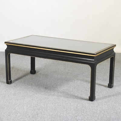 Lot 287 - An oriental style black coffee table, with...