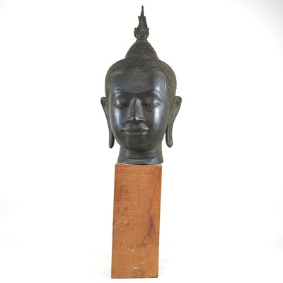 Lot 237 - An Eastern bronze life-sized Buddha head,...