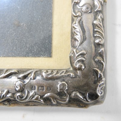 Lot 25 - An early 20th century silver photograph frame,...