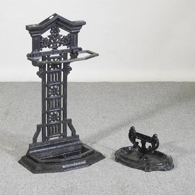 Lot 388 - A black painted cast iron stick stand, 76cm...