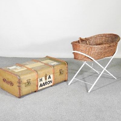 Lot 570 - An early 20th century wooden bound trunk, 89cm...