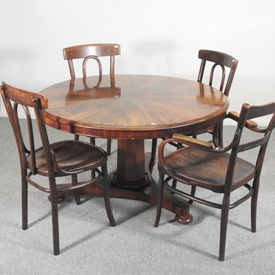 Lot 346 - A reproduction mahogany circular dining table,...