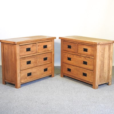 Lot 437 - A pair of modern light oak chests of drawers (2)