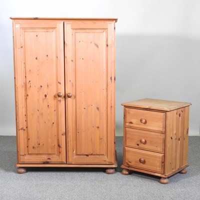 Lot 307 - A modern pine double wardrobe, together with a...
