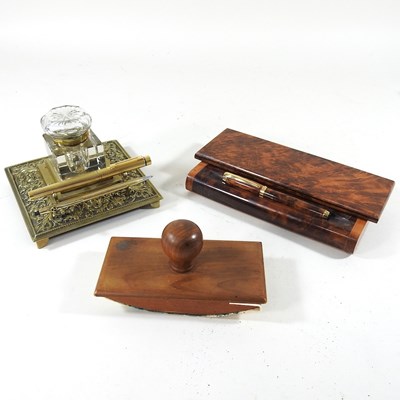 Lot 110 - A walnut desk stand, 23cm wide, containing a...