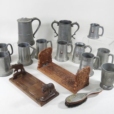 Lot 136 - An early 20th century Black Forest carved...