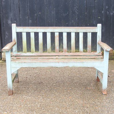 Lot 436 - A painted wooden garden bench, 129cm wide