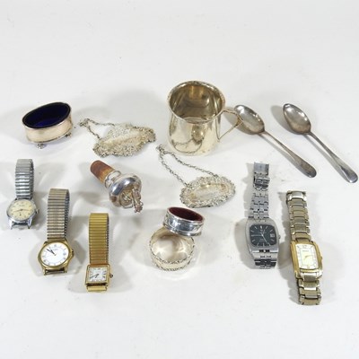 Lot 358 - An early 20th century silver mug, together...