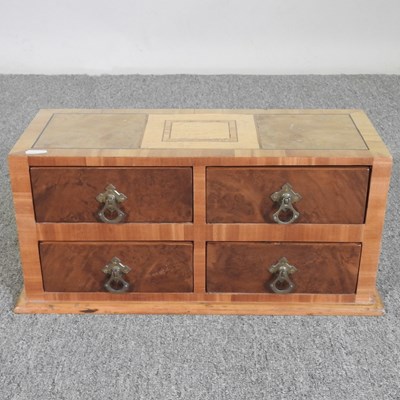Lot 204 - A miniature inlaid walnut chest, with four...