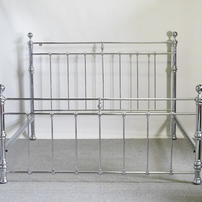 Lot 606 - A Victorian style chrome effect Super King...