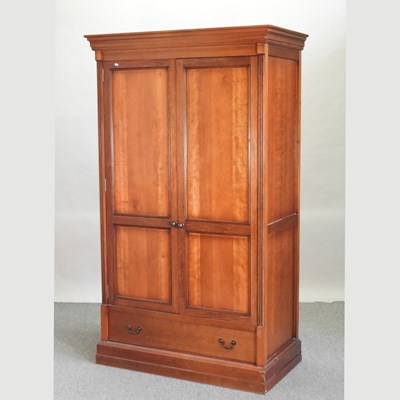 Lot 431 - A modern cherrywood double wardrobe