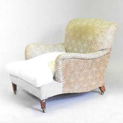 Lot 107 - An early 20th century upholstered armchair, by...