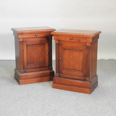 Lot 567 - A pair of modern cherrywood bedside cabinets