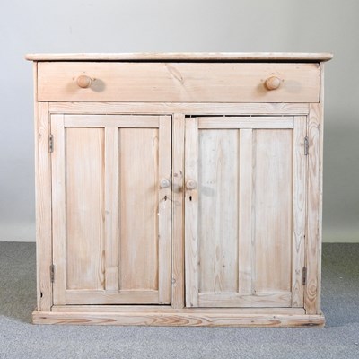 Lot 454 - An antique pine side cabinet, with a single...