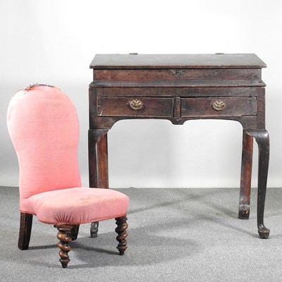 Lot 660 - An 18th century clerk's desk, with a hinged...