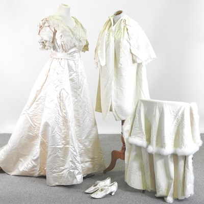 Lot 157 - An Edwardian satin and lace wedding dress,...