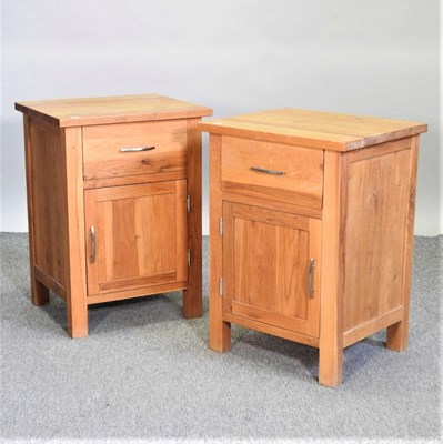 Lot 432 - A pair of modern light oak bedside cabinets