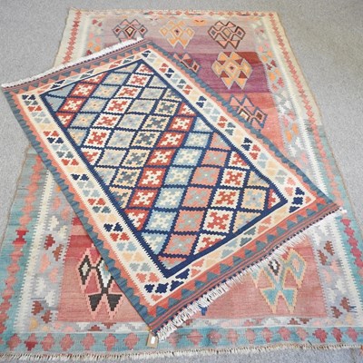 Lot 628 - A kelim rug, with three rows of coloured...