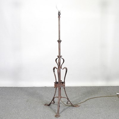 Lot 834 - An Arts and Crafts steel telescopic standard...