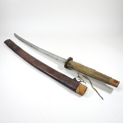 Lot 28 - An early 20th century Japanese sword, with a...