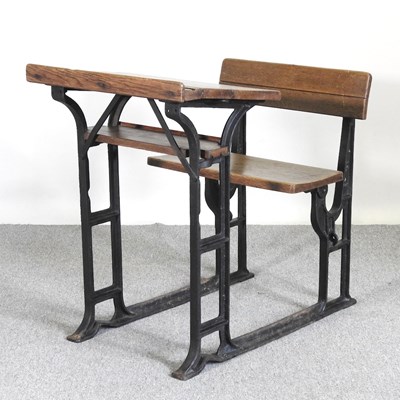 Lot 549 - An early 20th century wooden school desk, on...