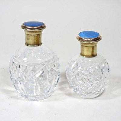 Lot 30 - A cut glass scent bottle, with a gilt and blue...