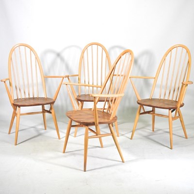 Lot 377 - A set of four 1970's Ercol light elm hoop back...