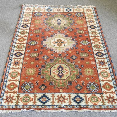 Lot 876 - A Turkish woollen rug, with all over...