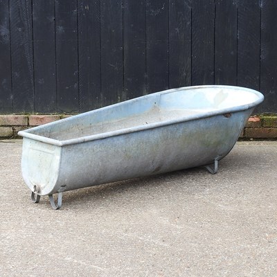 Lot 596 - A cast iron bath, of tapered shape, 160cm long