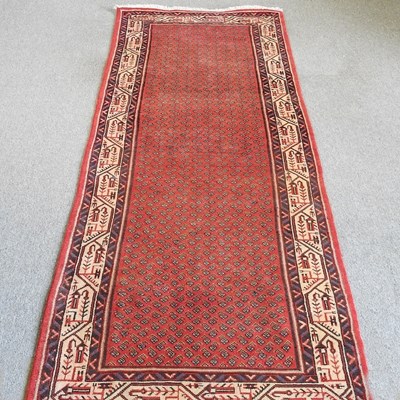 Lot 737 - A Persian runner, with all over designs,...