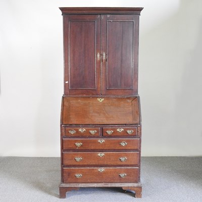 Lot 625 - An 18th century oak bureau cabinet, on bracket...