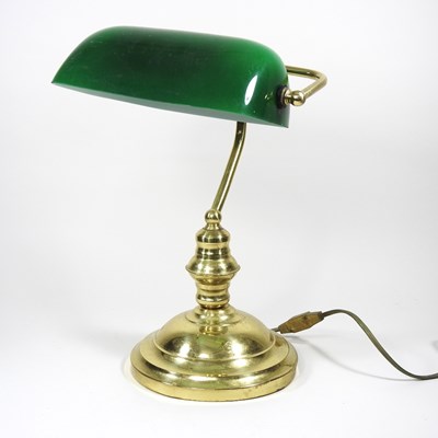 Lot 617 - A brass desk lamp, with a green glass shade,...