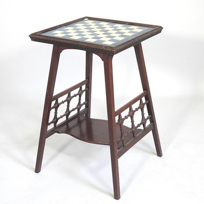 Lot 103 - An Art Nouveau mahogany games table, in the...