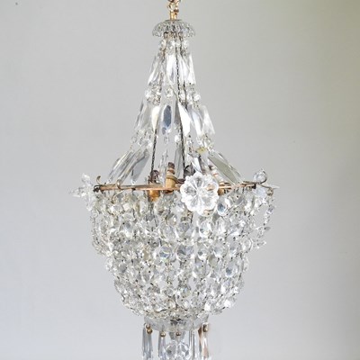 Lot 417 - A cut glass chandelier, 41cm diameter